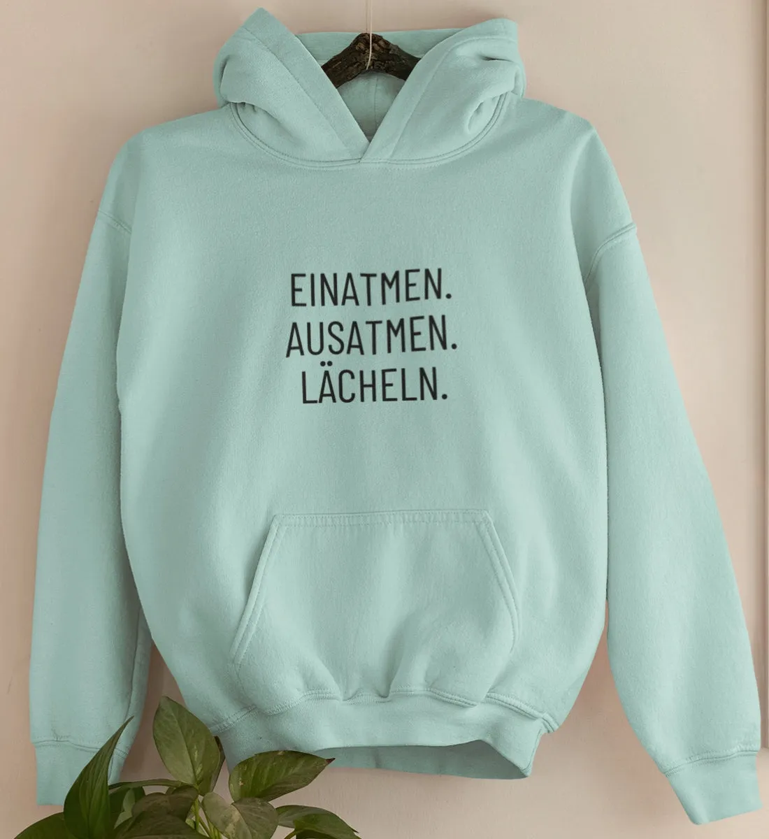 Einatmen. Ausatmen. Lächeln. Bio Hoodie Unisex