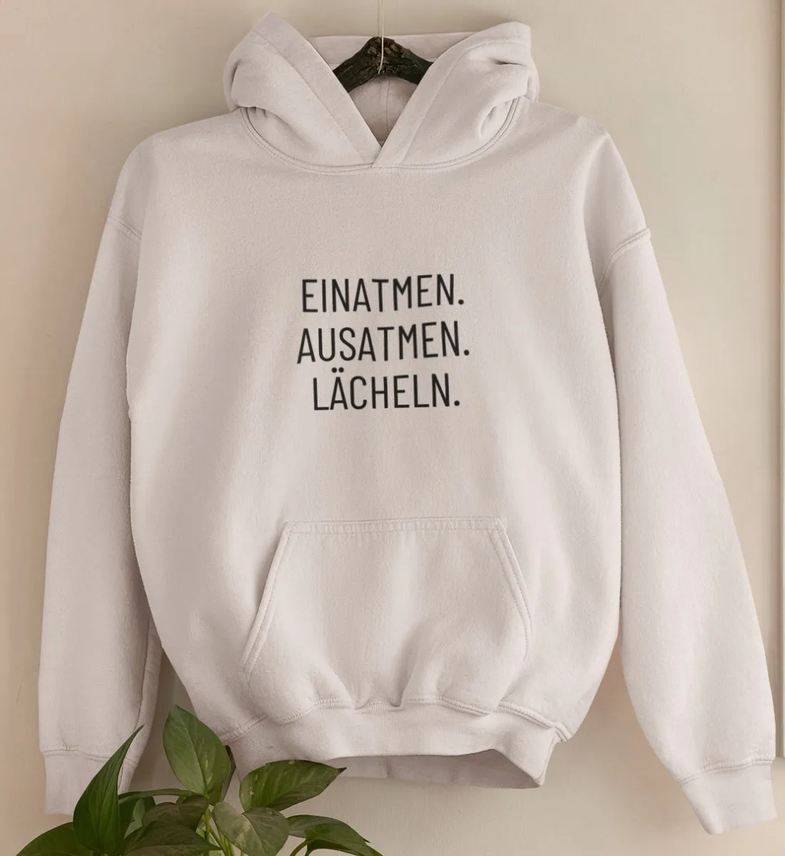 Einatmen. Ausatmen. Lächeln. Bio Hoodie Unisex